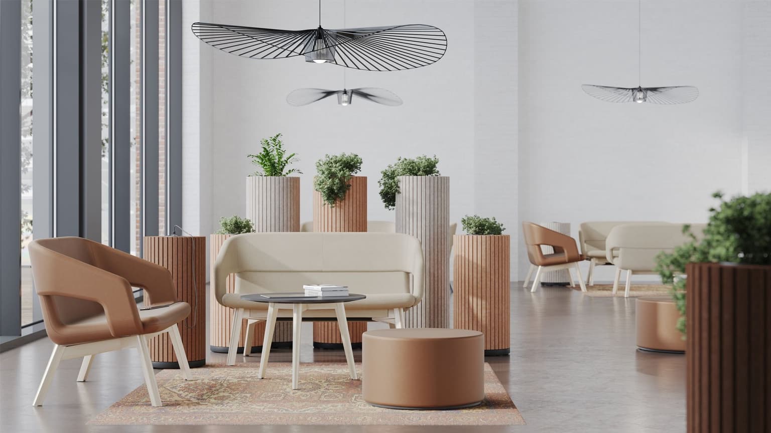 Zachtroze kleuren in een zithoek in een kantine.